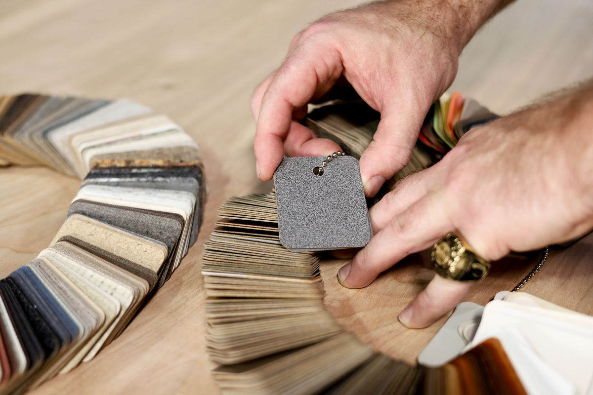 Custom poker table material choices, featuring various textures, grains, and color selections.