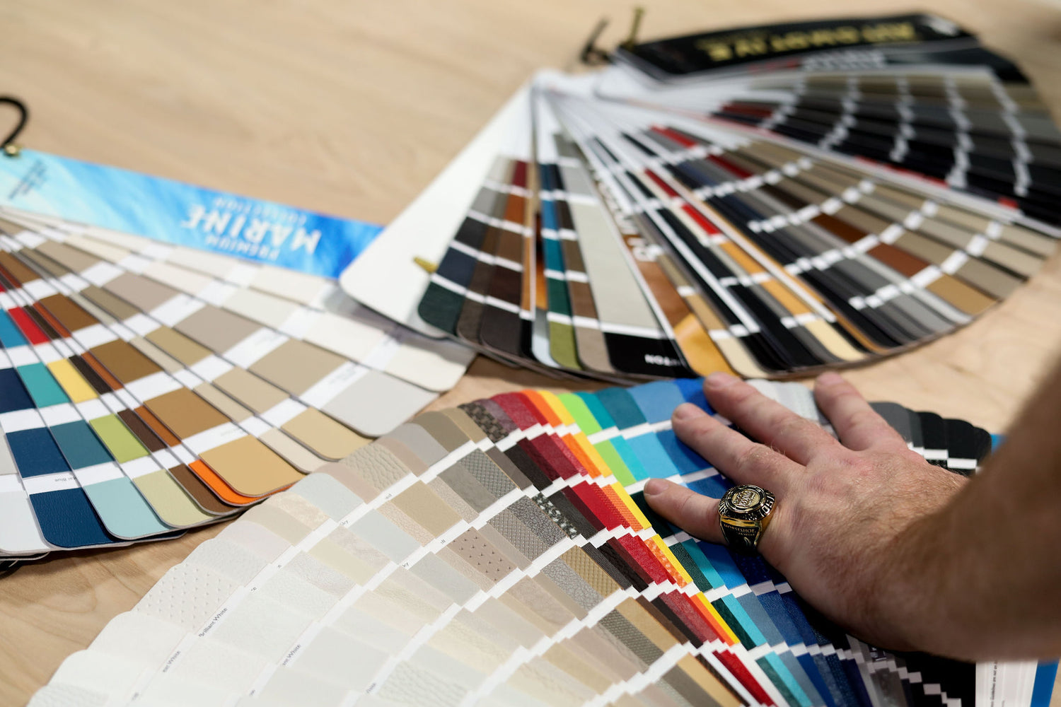 A collection of high-end vinyl materials for custom poker table upholstery.